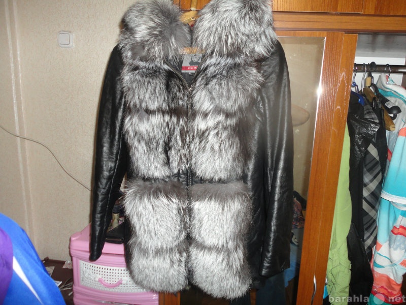 Продам: черная кожанная куртка с огромной черноб